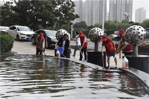 体育竞猜官网·(中国)官方网站联合商务区社区开展“清洁家园 美化社区”       主题志愿服务活动